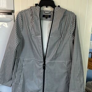 Checkered raincoat size M